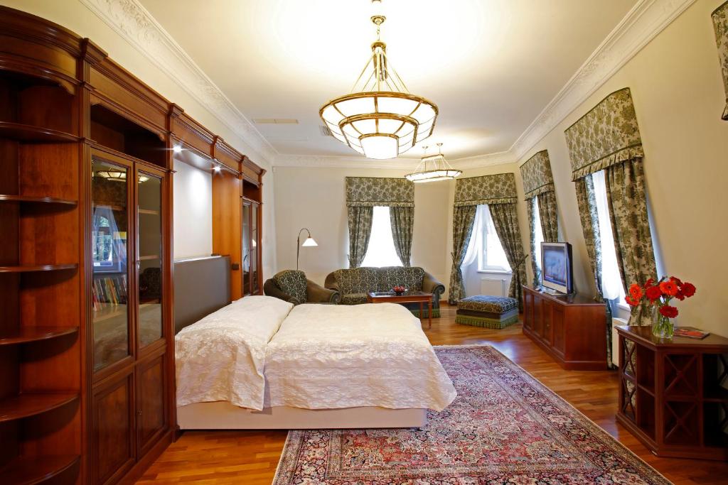 Postel nebo postele na pokoji v ubytování Spa Hotel Schlosspark