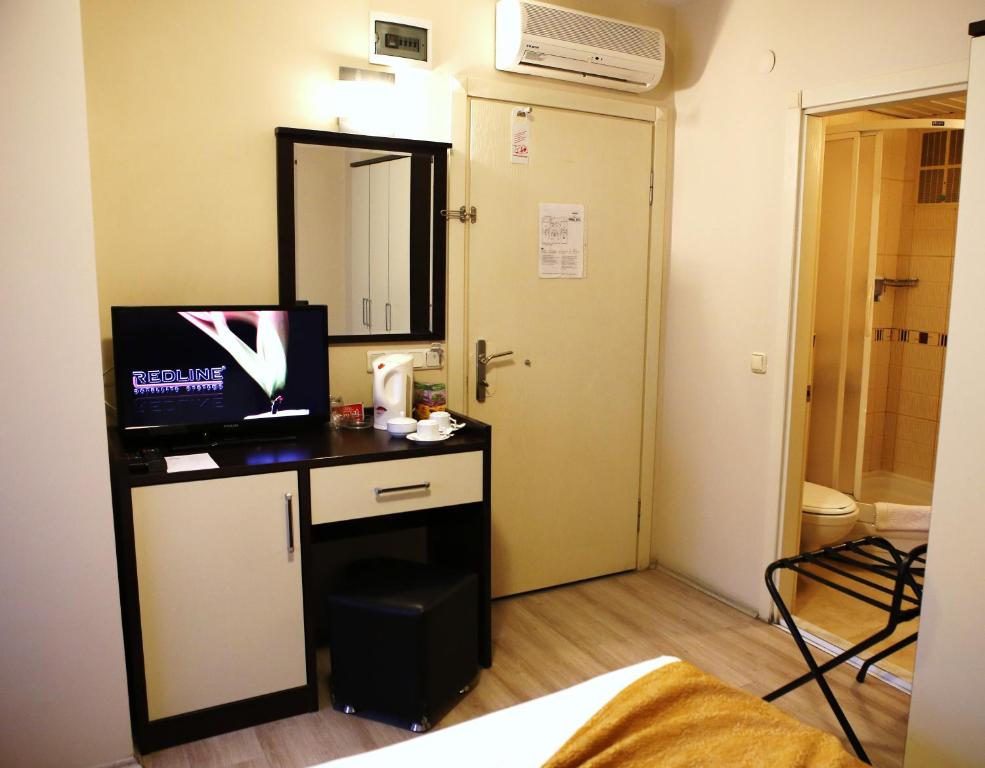 Kuchyň nebo kuchyňský kout v ubytování Canakkale Bogaz Hotel