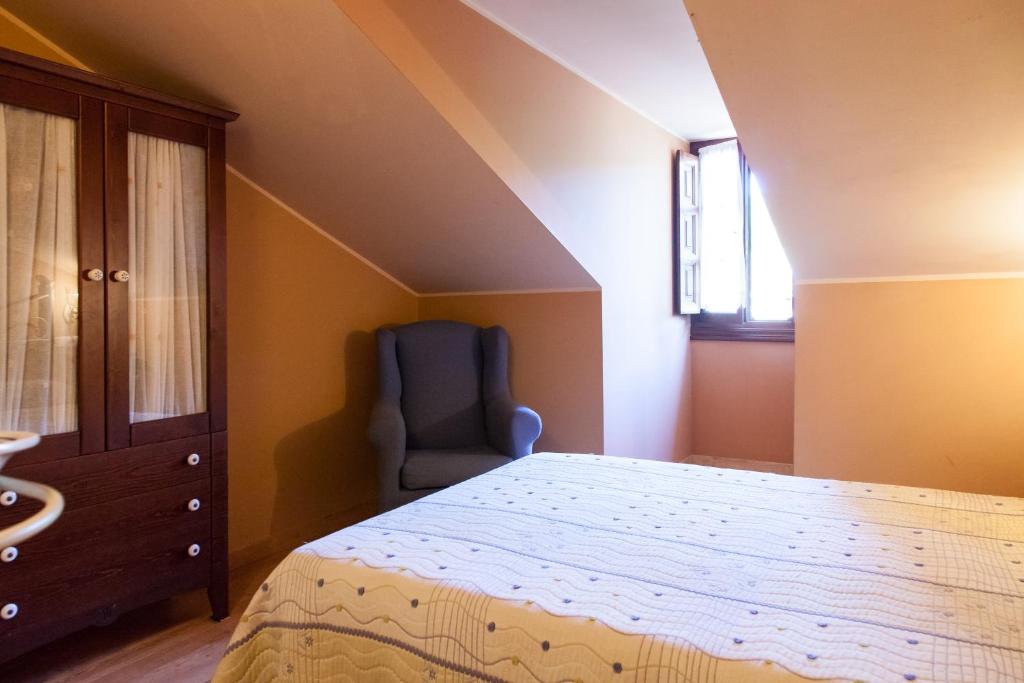 Postel nebo postele na pokoji v ubytování Hosteria Hijuelas