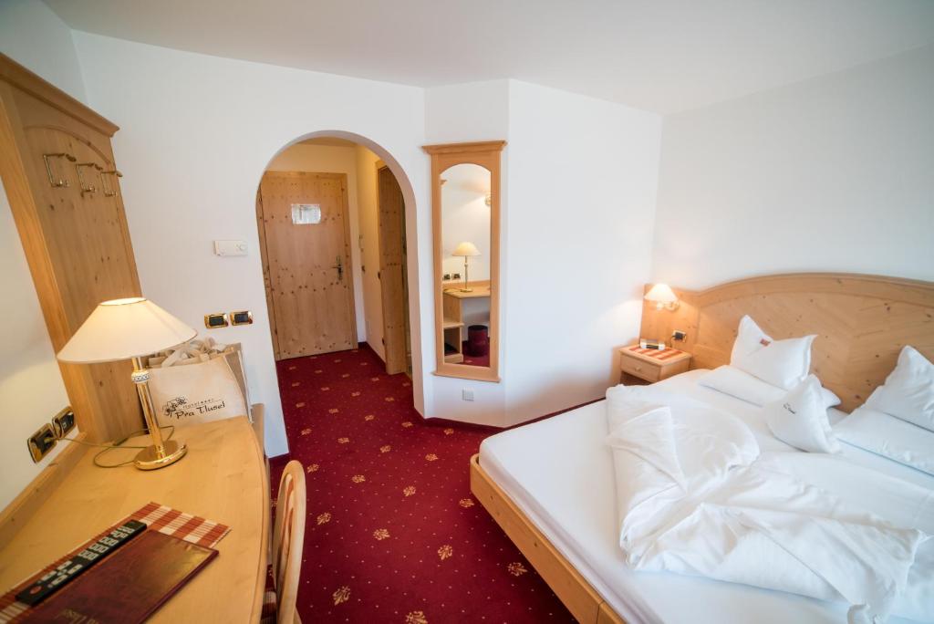 Postel nebo postele na pokoji v ubytování Hotel Pra Tlusel