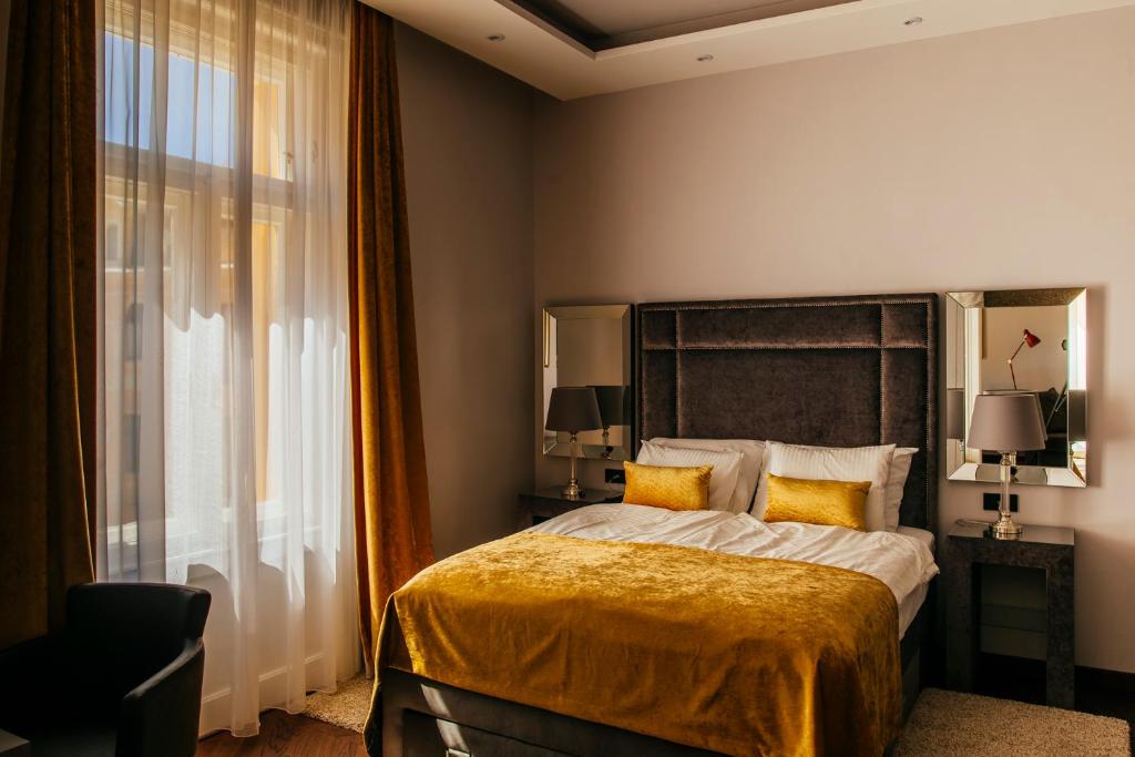 Posteľ alebo postele v izbe v ubytovaní Premium Apartments Villa Herkules