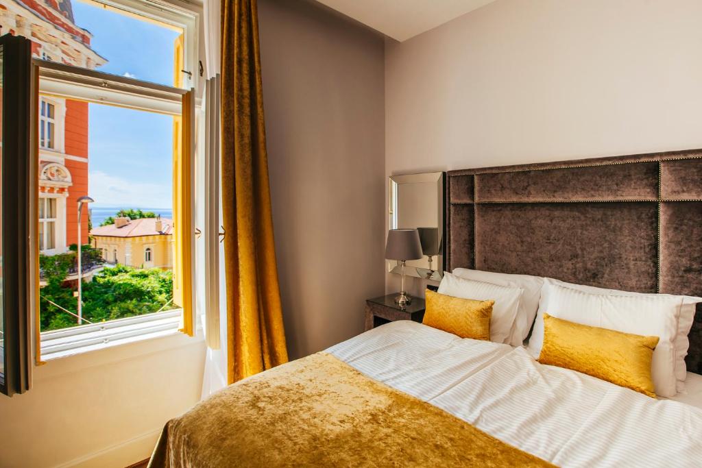 Posteľ alebo postele v izbe v ubytovaní Premium Apartments Villa Herkules