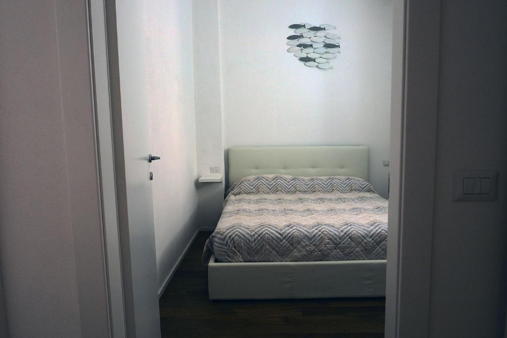 Postel nebo postele na pokoji v ubytování Marina Apartments