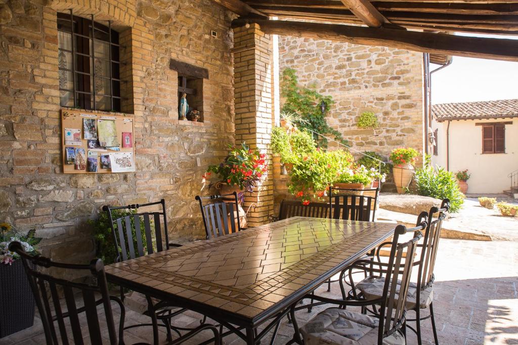 Patio lub wspólna przestrzeń na świeżym powietrzu w obiekcie Agriturismo il Cicaleto