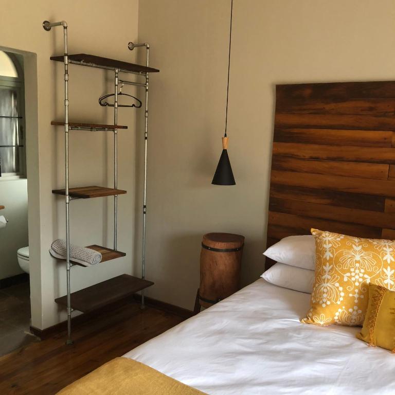 Postel nebo postele na pokoji v ubytování Blue Rain Guest House