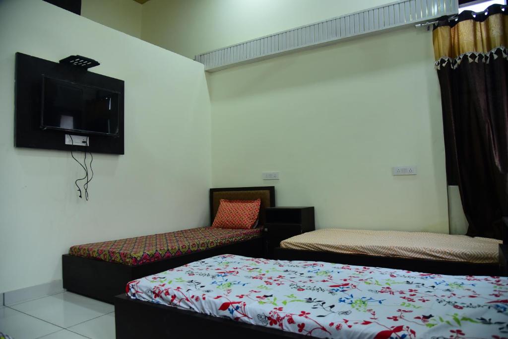 Postel nebo postele na pokoji v ubytování Nutz Backpackers