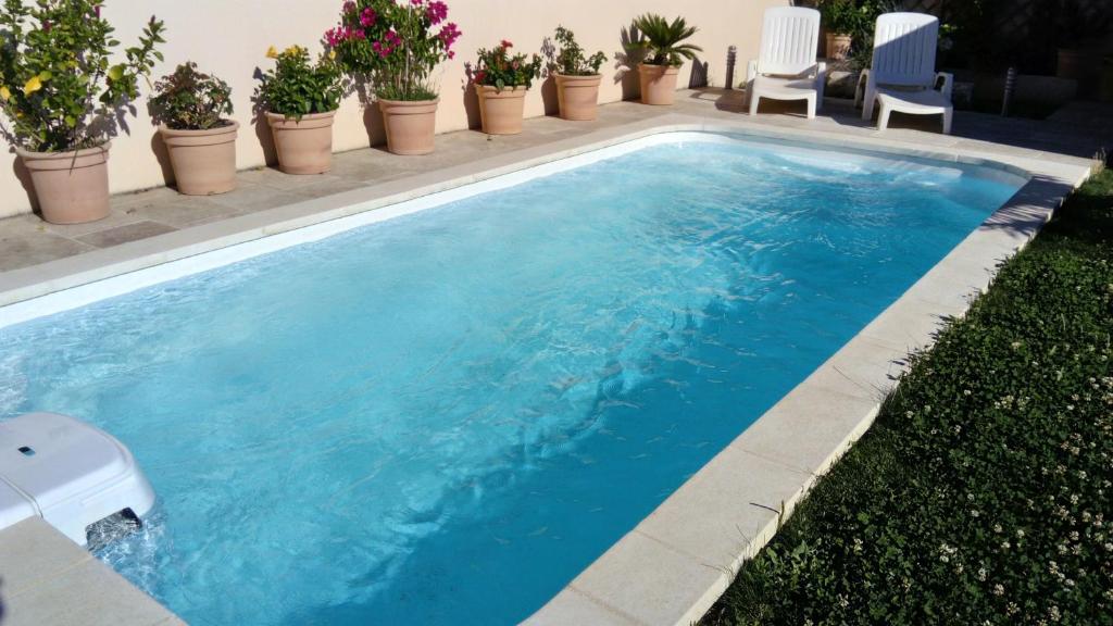 Bazén v ubytování L'Hibiscus Chambre d'Hôte nebo v jeho okolí