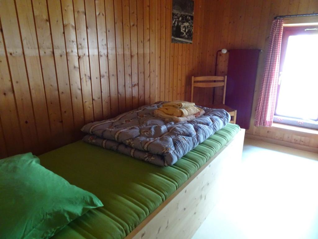 Postel nebo postele na pokoji v ubytování Hostel im Oltä Stall