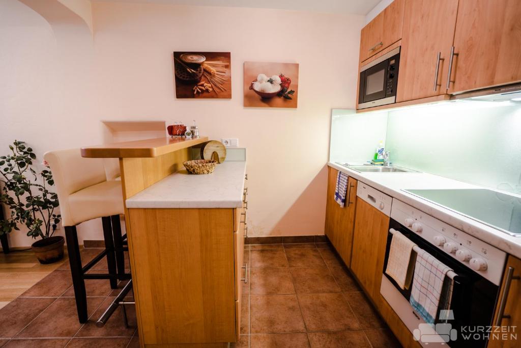 A kitchen or kitchenette at Appartements Steingasse
