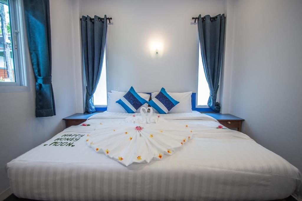 Postel nebo postele na pokoji v ubytování Adarin Beach Resort