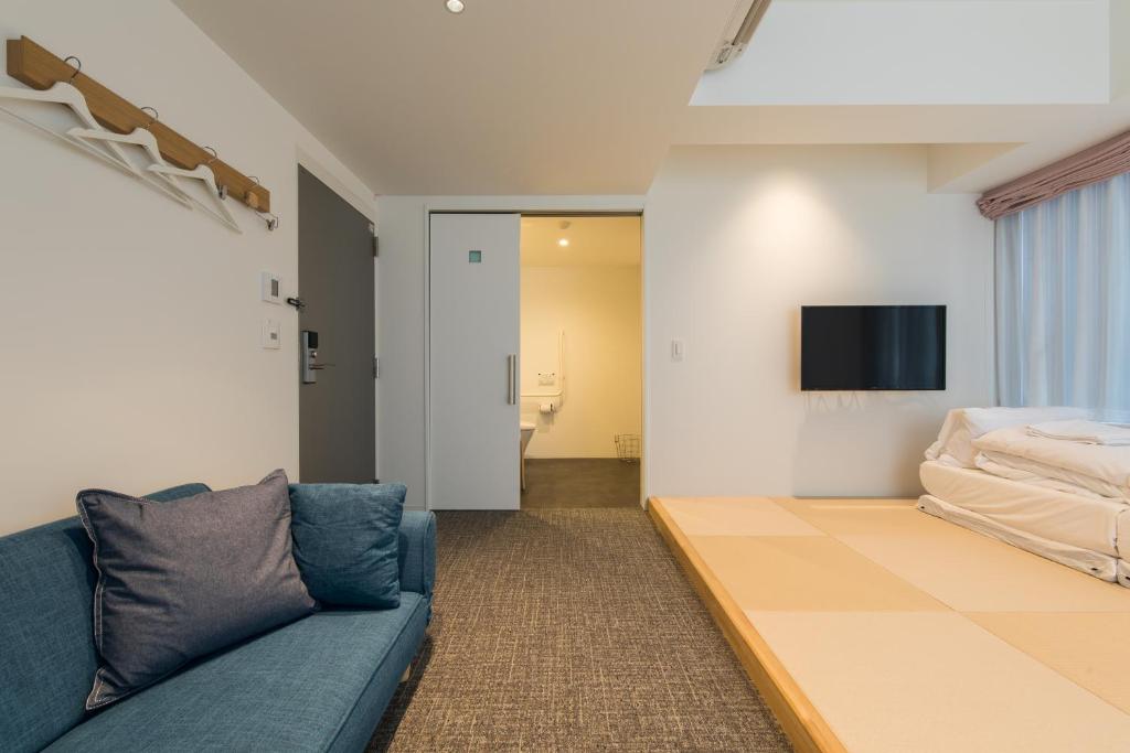 TV a/nebo společenská místnost v ubytování Imu Hotel Kyoto