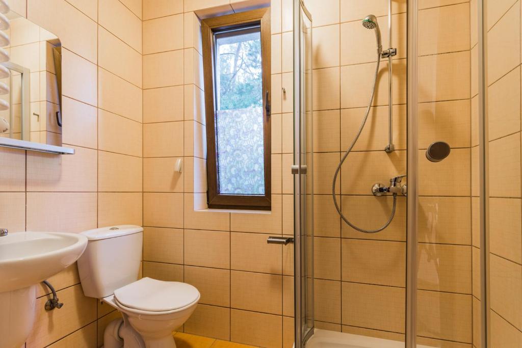 Kúpeľňa v ubytovaní Domaszowka