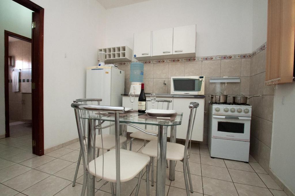 Kuchyň nebo kuchyňský kout v ubytování Hotel - Apart-hotel Chalé Executivo