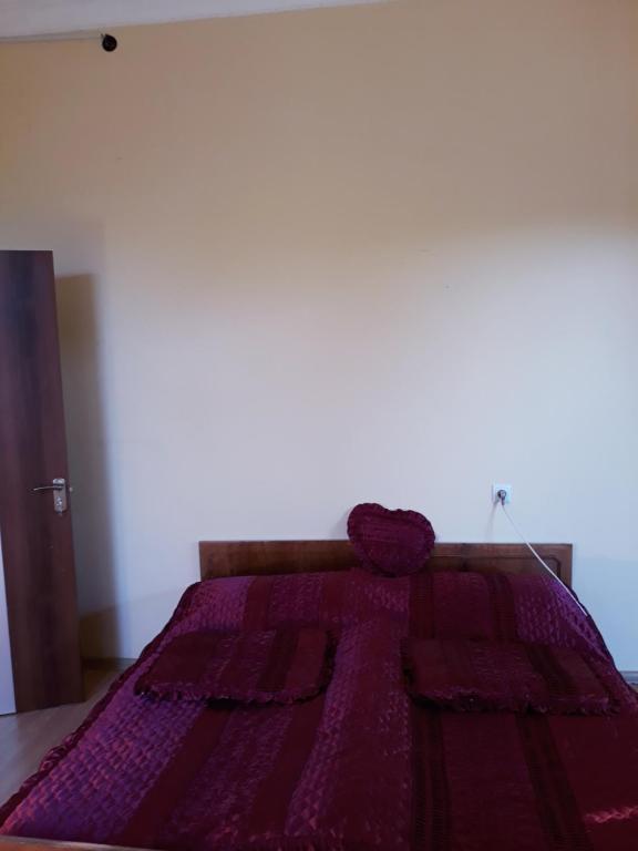 Postel nebo postele na pokoji v ubytování Malkhazi's Guesthouse