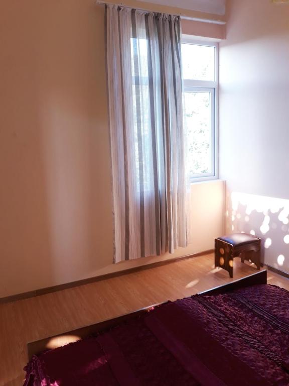 Postel nebo postele na pokoji v ubytování Malkhazi's Guesthouse