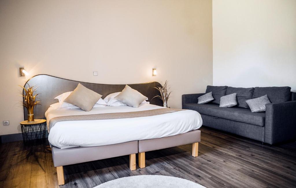 Postel nebo postele na pokoji v ubytování Aeroport Hotel - Parc Expo
