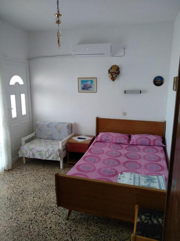 Posteľ alebo postele v izbe v ubytovaní Grigorios Apartments