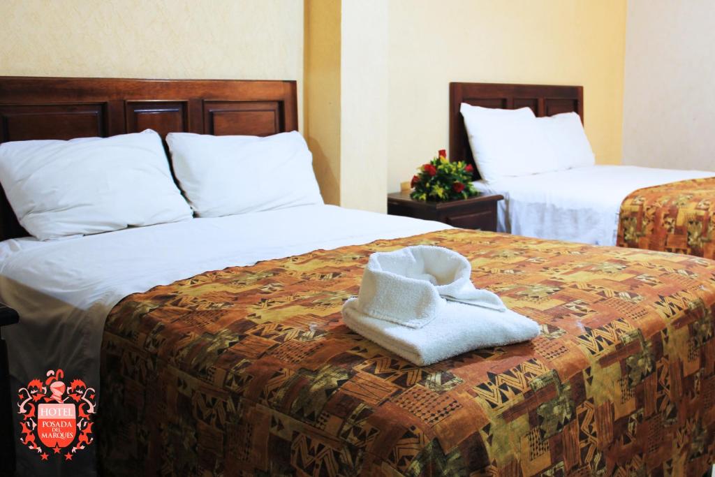 Postel nebo postele na pokoji v ubytování Posada del Marqués