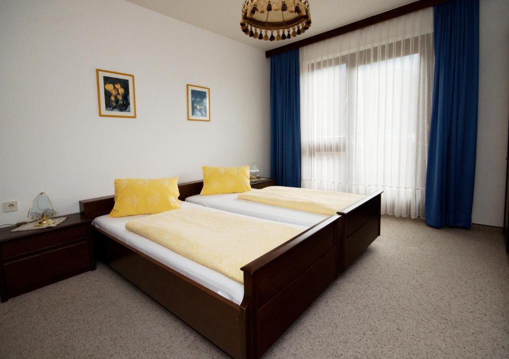 Postel nebo postele na pokoji v ubytování Haus Egger