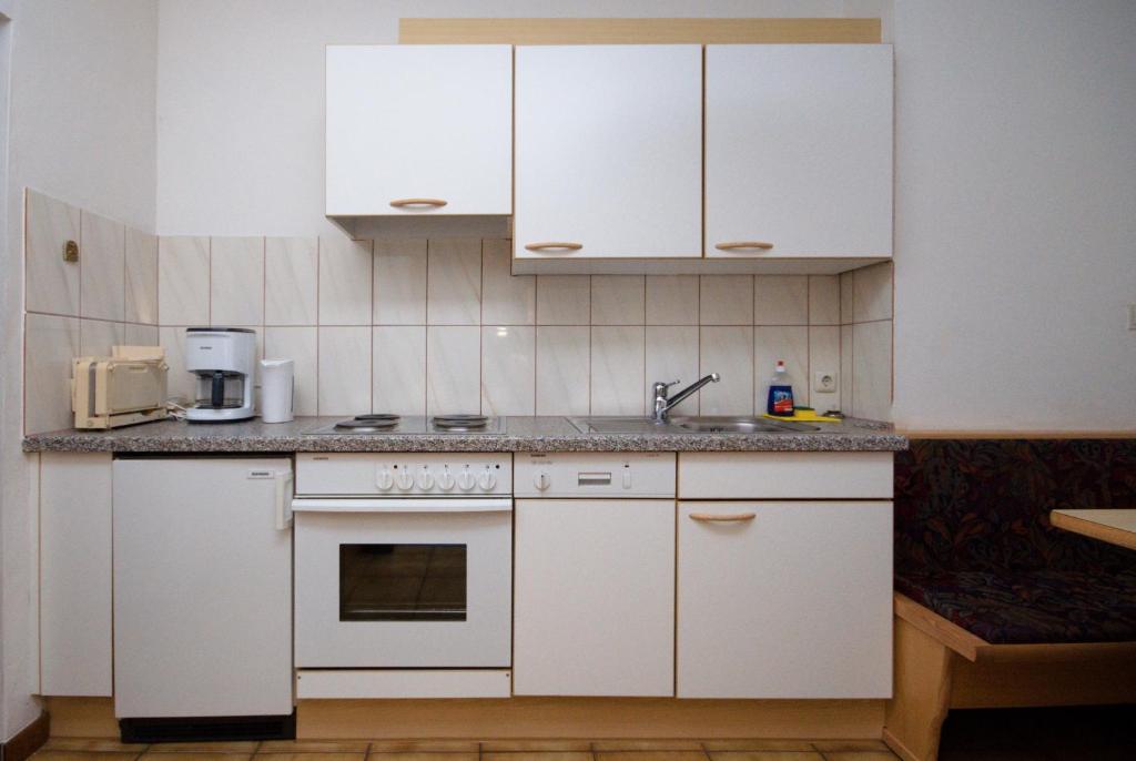 Kuchyň nebo kuchyňský kout v ubytování Haus Egger