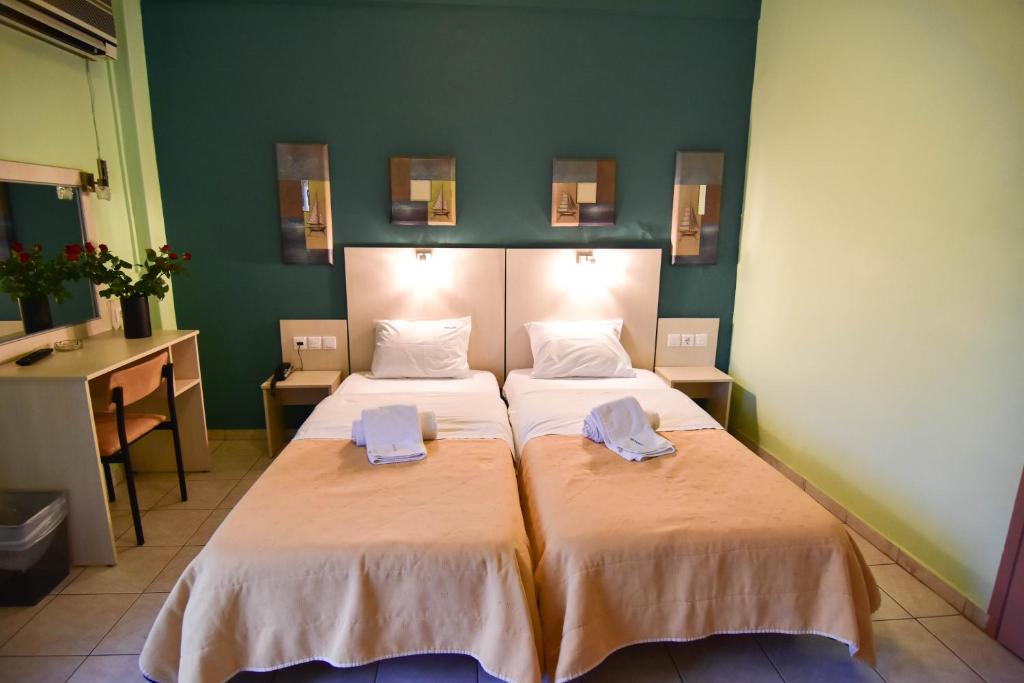 A bed or beds in a room at Iridanos