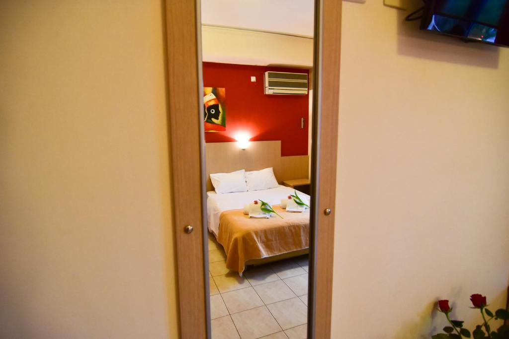 Postel nebo postele na pokoji v ubytování Iridanos