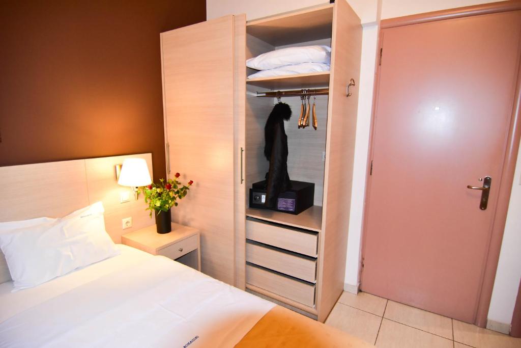 Postel nebo postele na pokoji v ubytování Iridanos