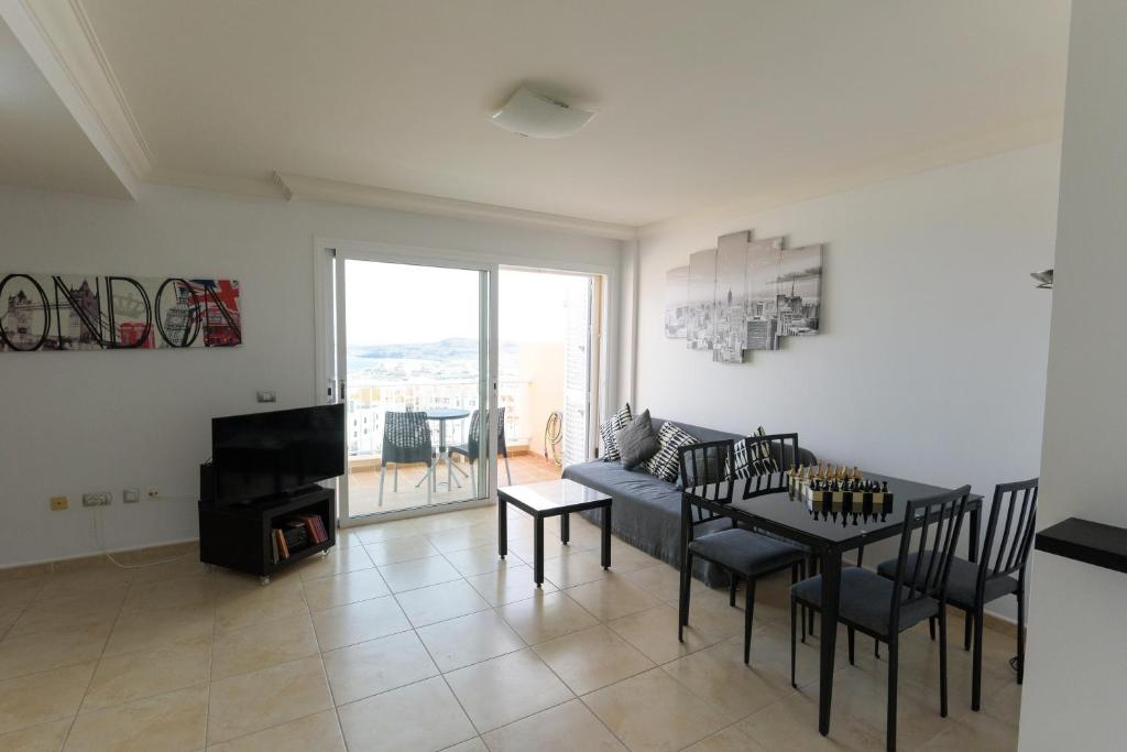 Posedenie v ubytovaní Apartamento en Residencial cary 2.