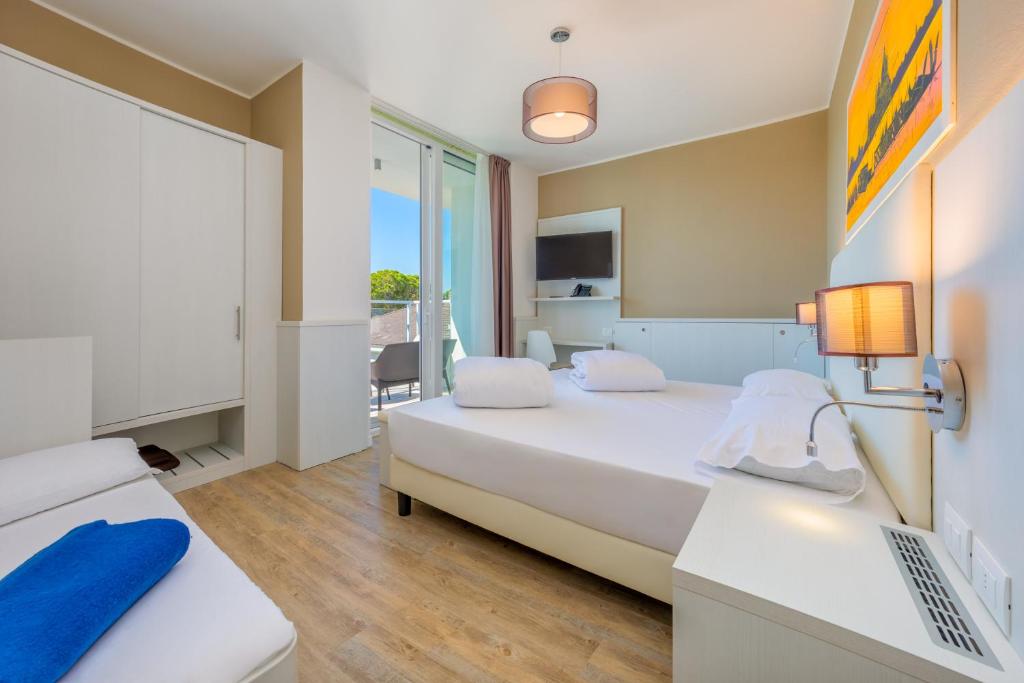 Postel nebo postele na pokoji v ubytování Marina Palace Hotel 4 stelle S