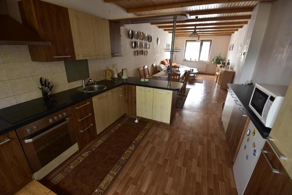 Kuchyň nebo kuchyňský kout v ubytování Privat BEA