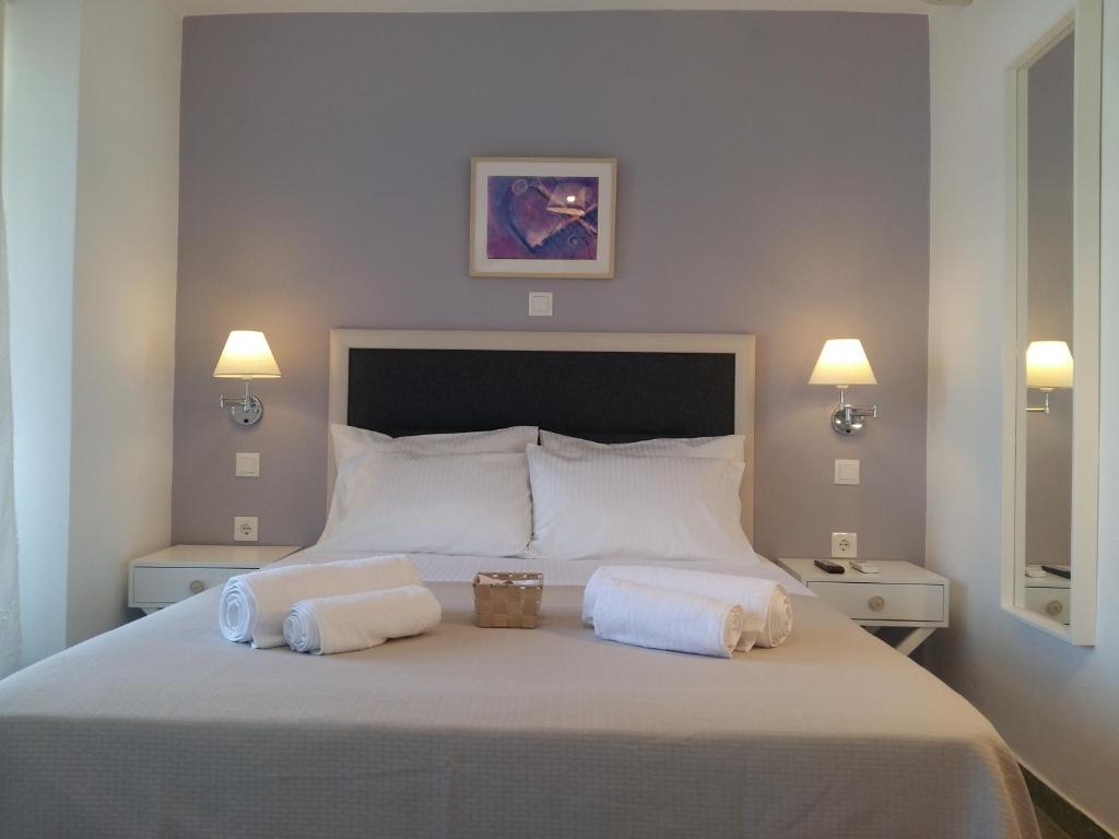 Postel nebo postele na pokoji v ubytování Sea Colours Parga