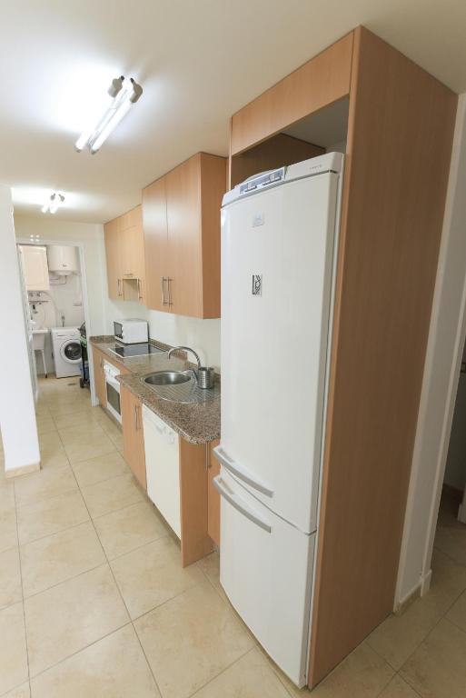 Kuchyňa alebo kuchynka v ubytovaní Apartamento en Residencial cary 2.