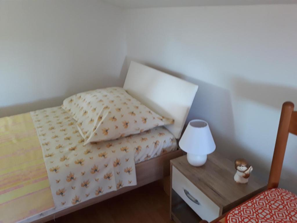 Postel nebo postele na pokoji v ubytování House Barizoni