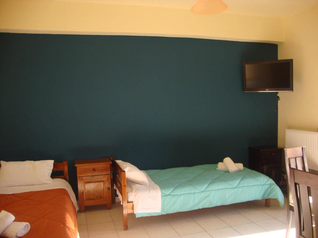 Postel nebo postele na pokoji v ubytování Kafiona Guesthouse