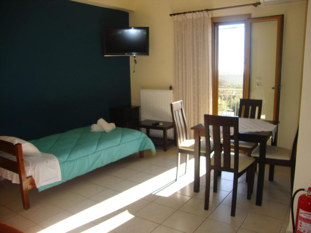 Postel nebo postele na pokoji v ubytování Kafiona Guesthouse