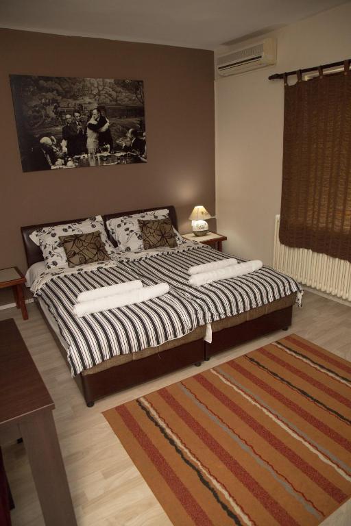 Postel nebo postele na pokoji v ubytování Apartments Cvetkovic Relax