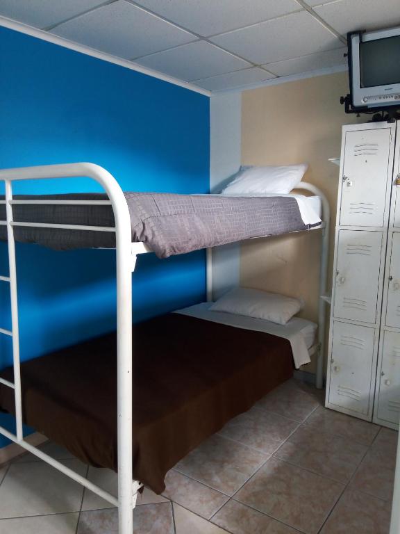 Postel nebo postele na pokoji v ubytování Hostel Room Aruba