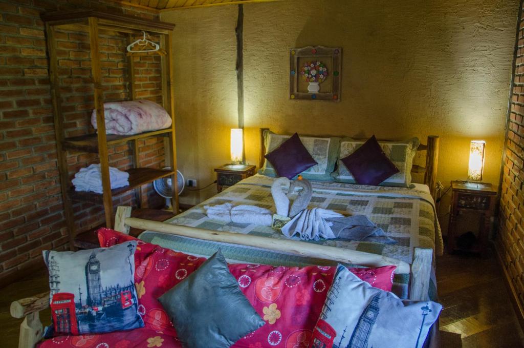 Katil atau katil-katil dalam bilik di Chalés Lirio dos Vales