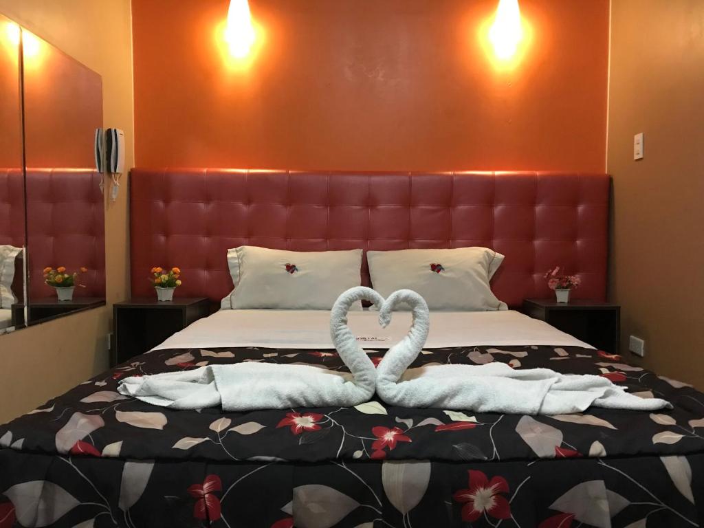 Ένα ή περισσότερα κρεβάτια σε δωμάτιο στο Hotel Manantial No,002