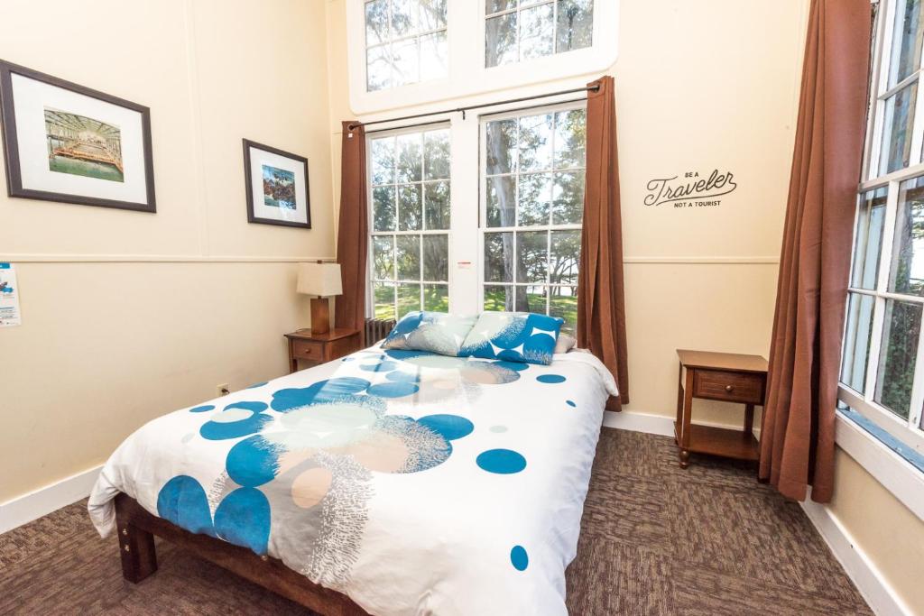 a bedroom with a bed and a window at HI San Francisco Fisherman's Wharf Hostel in San Francisco