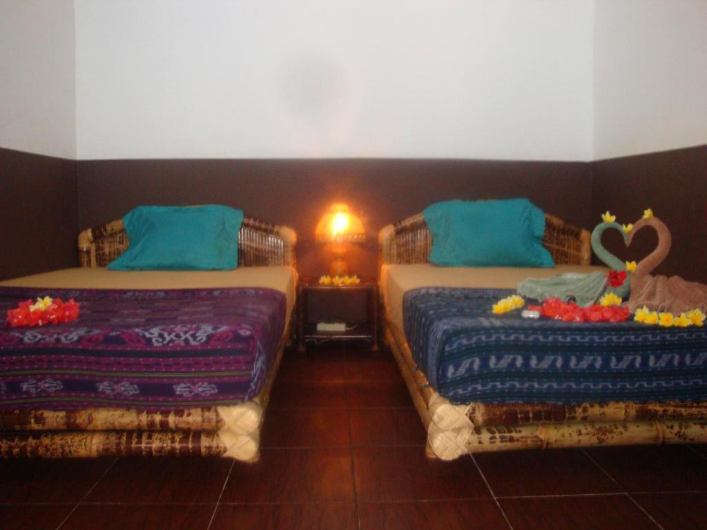 Postel nebo postele na pokoji v ubytování Relaxing Homestay