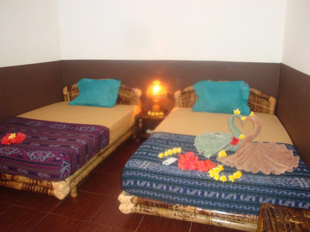 Postel nebo postele na pokoji v ubytování Relaxing Homestay