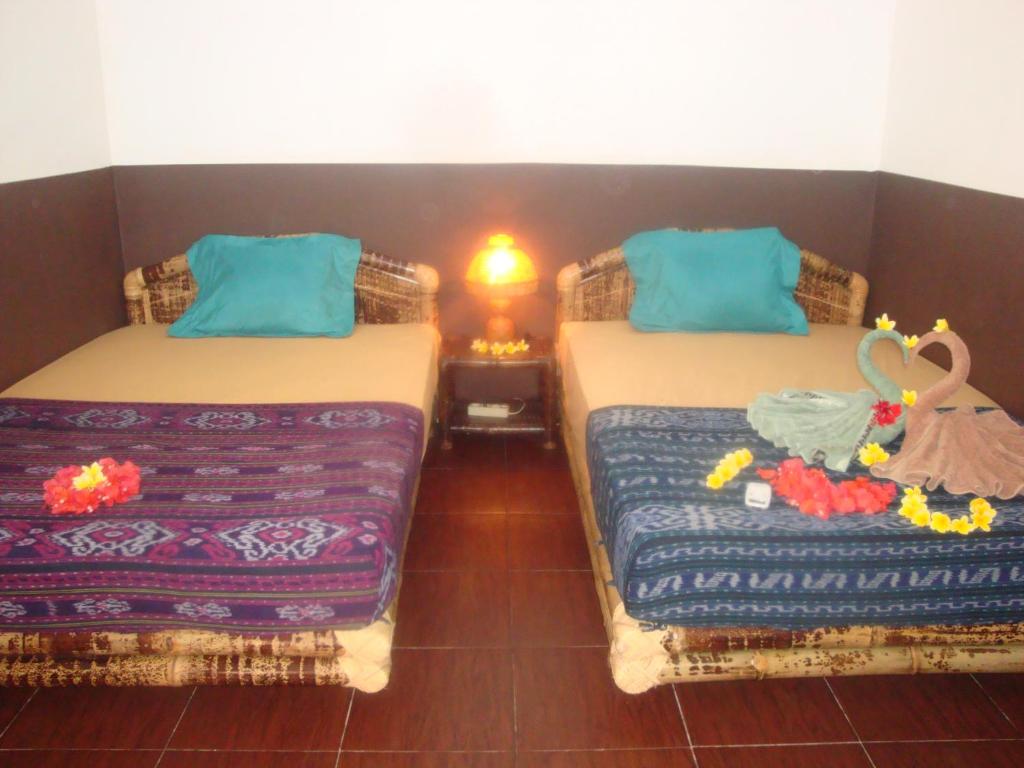 Postel nebo postele na pokoji v ubytování Relaxing Homestay
