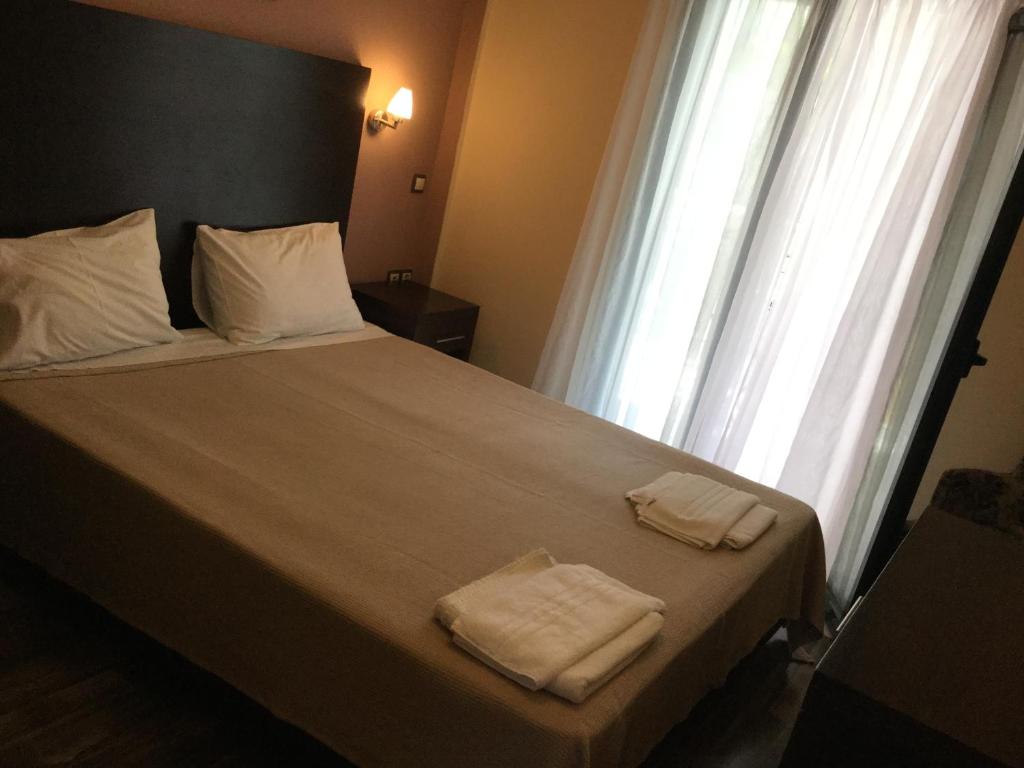 A bed or beds in a room at Villa Vasso