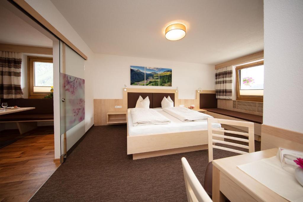Postel nebo postele na pokoji v ubytování Haus Montjola