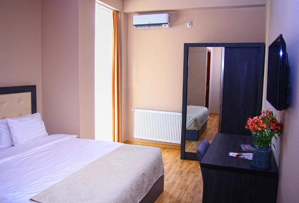 Postel nebo postele na pokoji v ubytování Rogalux Blue