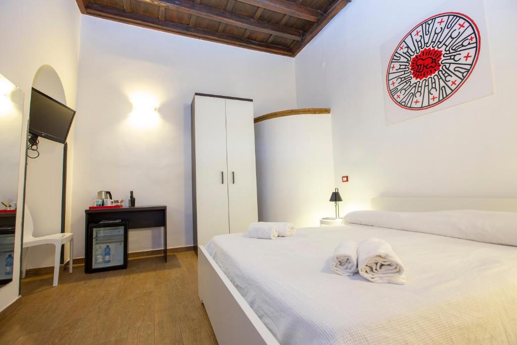 Łóżko lub łóżka w pokoju w obiekcie POP Art B&B