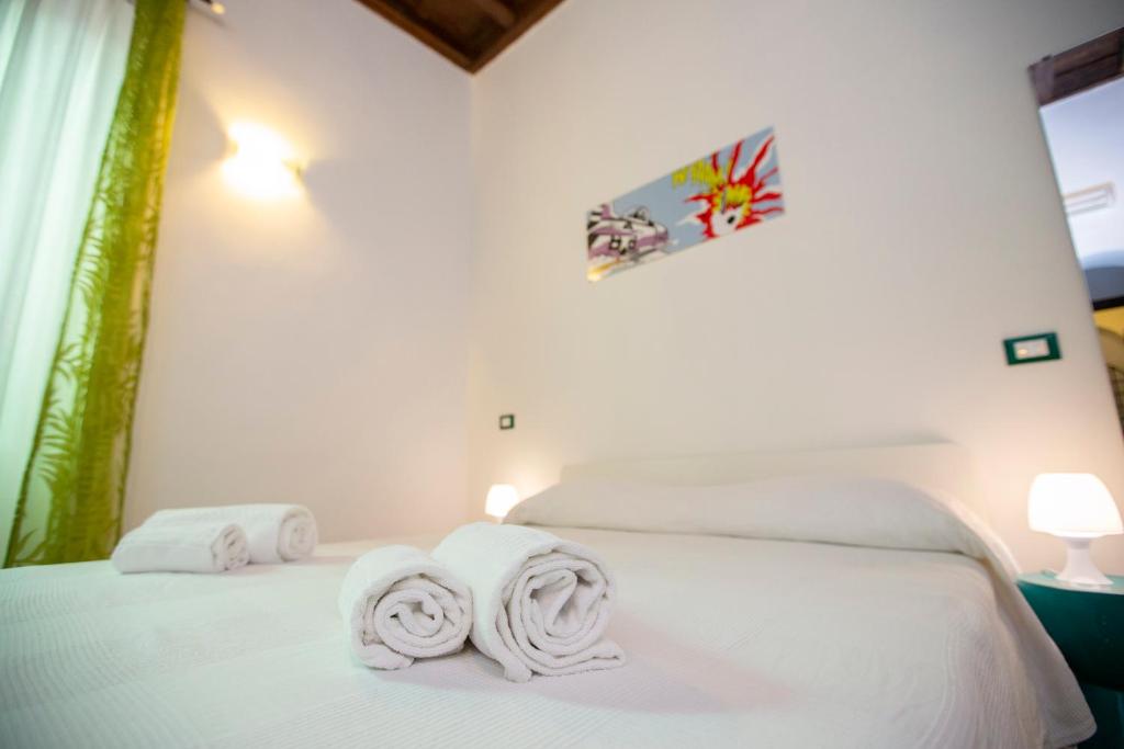 Łóżko lub łóżka w pokoju w obiekcie POP Art B&B