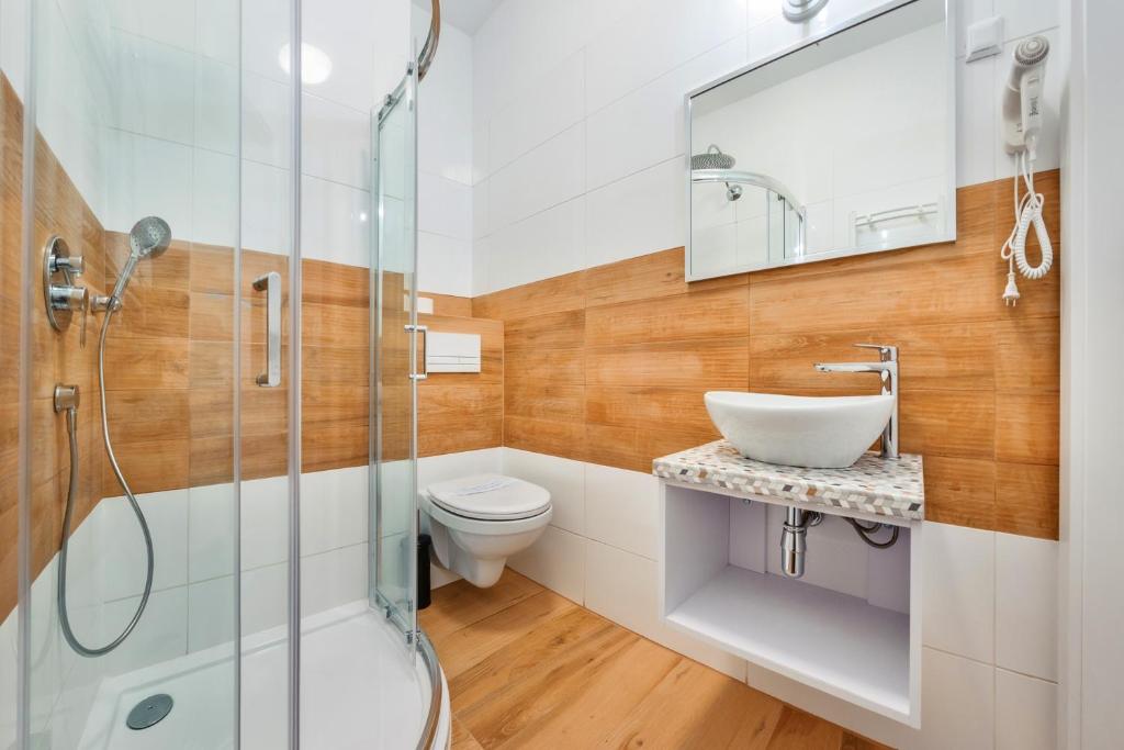 Kúpeľňa v ubytovaní Apartamenty Sun & Snow Seaside Grzybowo
