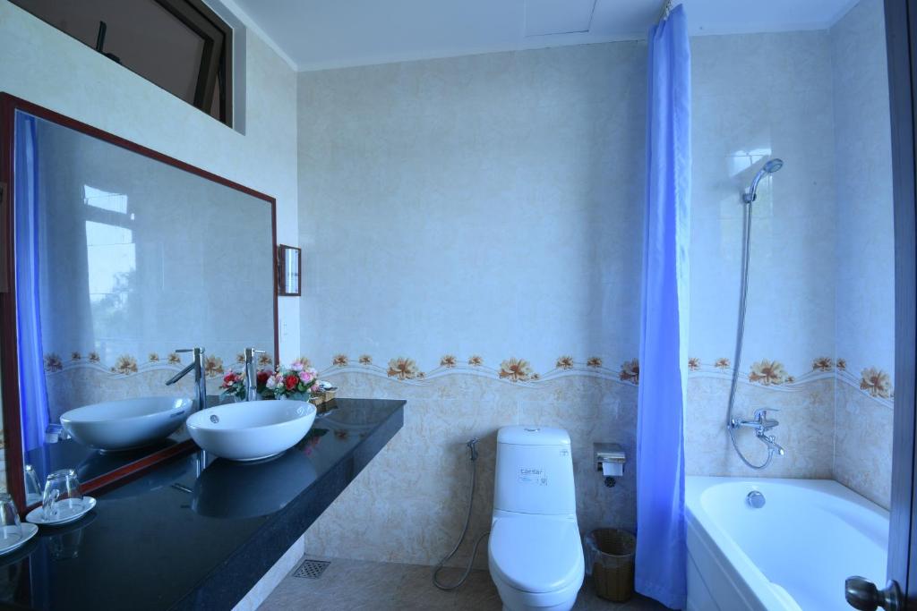 Koupelna v ubytování Tra Que Riverside Homestay